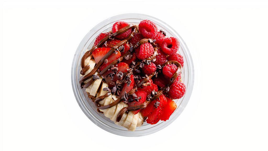 Frescatela Acai Bowl · Organic Acai, Chocolate granola, Strawberries, Banana, Raspberries, Chocolate nibs, & Drizzled nutella.