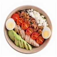 Cobb Salad · Eggs, tomato, crumbled blue cheese, avocado, bacon bits, & grilled grill chicken.