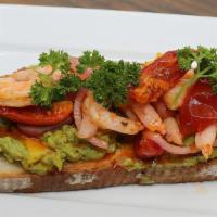 Piccante Toast · Roasted tomato, onion, sriracha shrimp, garnish with parsley on toasted bread & avocado.