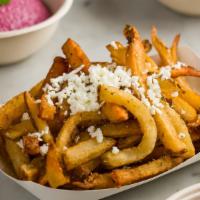 Greek Fries · Hand cut fries, topped with oregano and feta.