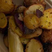 Lemon Potatoes · Tricolor roasted potatoes seasoned with lemon, oregano and extra virgin olive oil
