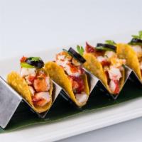 Maine Lobster Taco · Ceviche style, red onion, cilantro, jalapeño, black olive, sweet chili sauce
