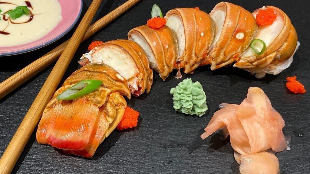 Sushi Lover · 8 pieces sushi & rainbow roll.
