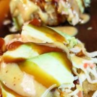 Avocado Crab Salad · With ginger dressing.