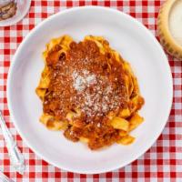 Pappardelle With Bolognese · 100% Ground Beef Bolognese Sauce with egg-made fresh pasta