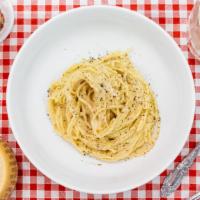 Tonnarelli Cacio & Pepe · Thick spaghetti with pecorino romano sauce. a classic roman dish.