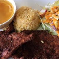 Pechuga Empanizada · Breaded chicken cutlet erved with rice and beans or salad and soup with soda.