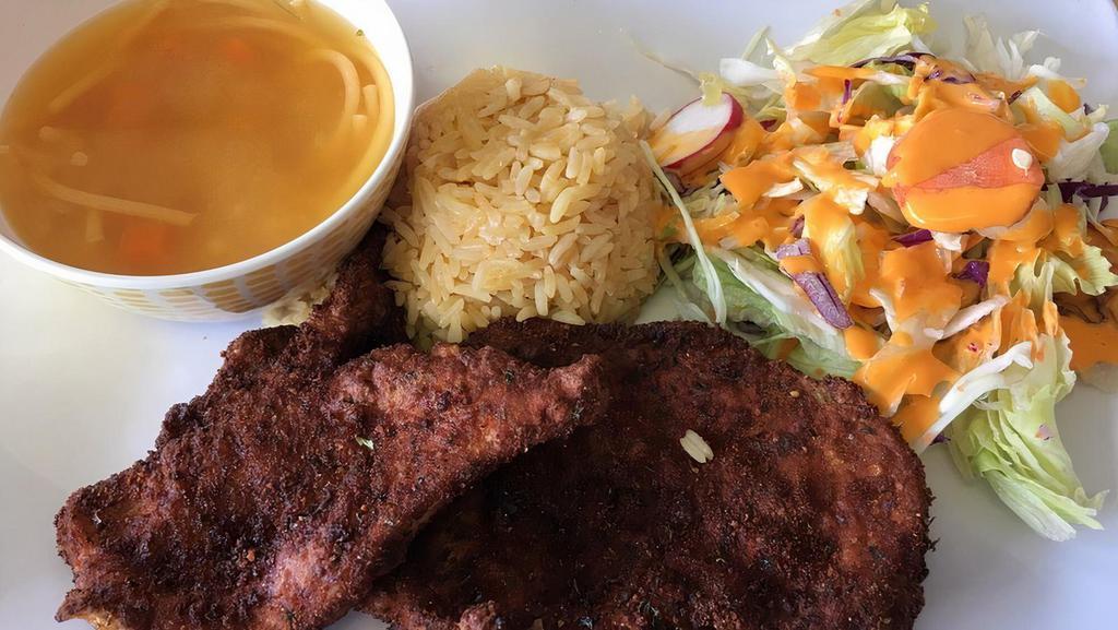 Pechuga Empanizada · Breaded chicken cutlet erved with rice and beans or salad and soup with soda.