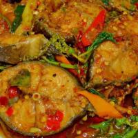Pad Ped Pla Duk / ผัดเผ็ดปลาดุก · *SEASONAL DISH* Stir-fried catfish with spicy paste, thai eggplant, green peppercorn, finger...