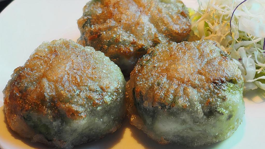 Kui Chai / กุ้ยช่าย · Crispy chive pancake served with home made jit-cho sauce.