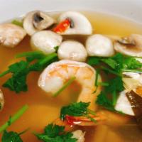 Shrimp Tom Yum Soup  / ต้มยำกุ้ง · Shrimp, mushroom, and cilantro with hot and sour soup. Spicy.