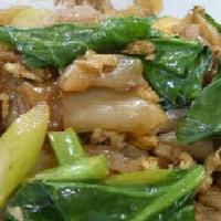 Pad Se Ew / ผัดซีอิ๊ว · Flat rice noodles sautéed with your choice of meat, Chinese broccoli, egg and sweet dark soy...
