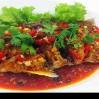 Fried Fish With Sweet Chili Sauce / ปลาราดพริก · Fried fish with basil and sweet chili sauce. Spicy.
