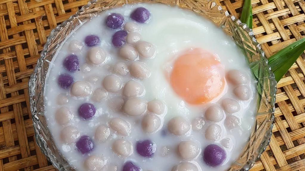 Taro Balls In Coconut Milk / บัวลอยเผือกไข่หวาน · Served with poached egg and young coconut.