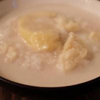 Durian With Sticky Rice · Durian in coconut milk with sweet sticky rice.
