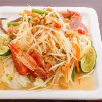 Som Tum Poo (Lao Papaya Salad With Salted Crab) · Shredded green papaya with hard-shell crab anchovy sauce, tomatoes, lime, garlic, chili pepp...