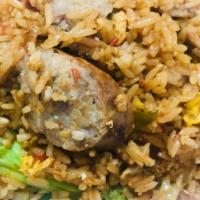 Esan Sausage Basil Fried Rice · Stir-fried fermented pork sausage cooked with jasmine rice, egg, basil, seasonal mixed veget...