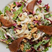 Tre Colori Salad · Baby arugula, radicchio, endives, roasted spicy walnuts, and roasted pears with homemade gor...