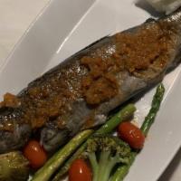 Branzino · Served with homemade mashed potatoes and seasonal vegetables. Whole fish.