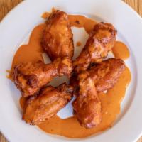 Buffalo Style Wings (10) · Served with blue cheese & hot sauce.