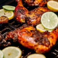 Jerk Chicken Meal · Authentic Caribbean Jerk Chicken | Comes with rice & salad