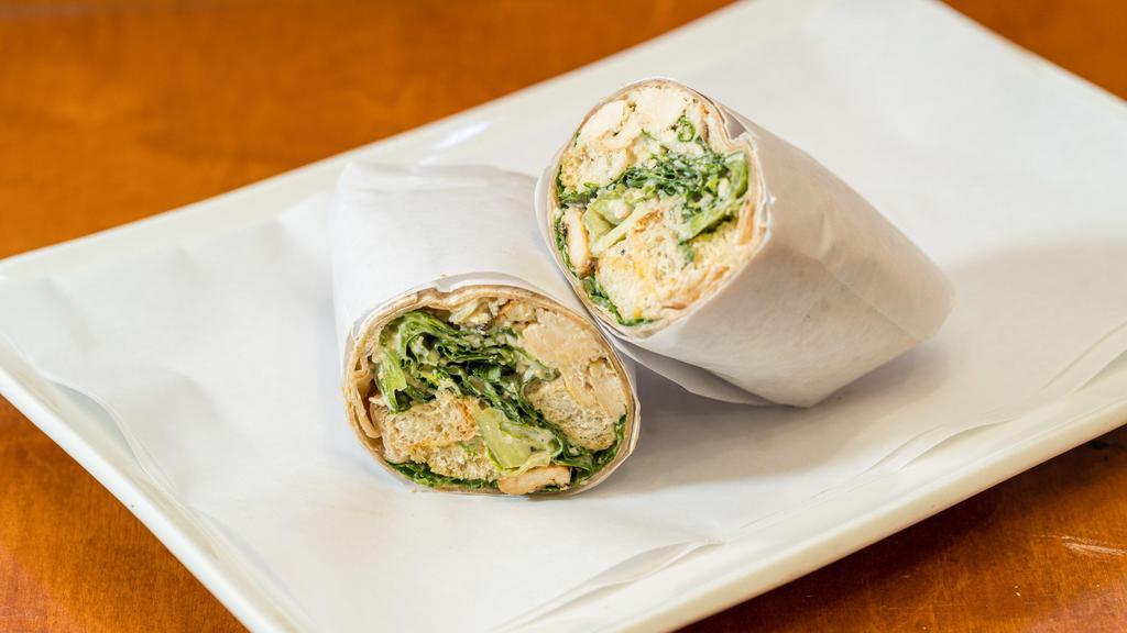 Caesar Wrap · Grilled chicken, Caesar dressing, tomatoes, and Parmesan cheese on a gourmet wrap.