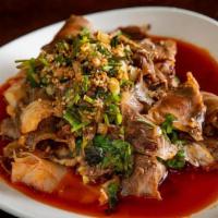 Beef & Tripe In Chili Oil' · Spicy. COLD sliced of beef and tripe tossed w/ chili oil, cilantro, peanuts and sesame seeds.