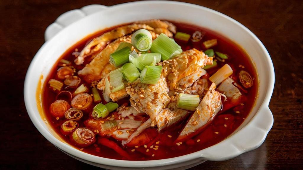 Chicken In Chili Oil' · Spicy. COLD sliced chicken with chili oil, topped with scallions and sesame seeds.