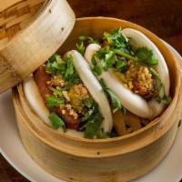 Pork Belly Buns (2Pc)' · Not Spicy. Braised pork belly in bao buns topped with cilantro, crushed peanuts and pickled ...