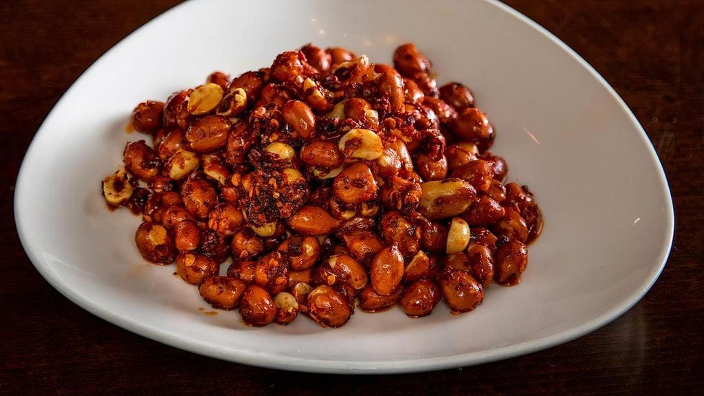 Crazy Peanuts' · Spicy. Shelled peanuts tossed with chili oil and sugar.