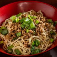 Dan Dan Noodle' · Spicy. Flour noodle tossed with house-made chili oil, sweet soy sauce, sesame paste, scallio...