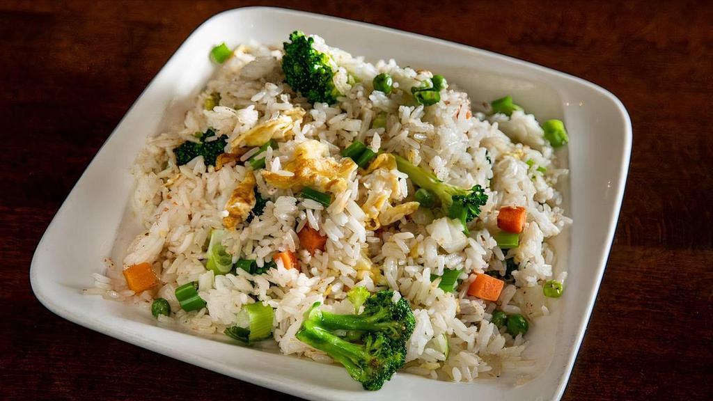 Fried Rice Gf' · Seasoned & stir-fried rice with peas, carrots, and onions. Not spicy. . (Egg option just egg and rice). (Vegetable option inc. broccoli & snow peas)