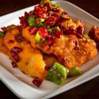 Dry Pepper Gf' · Potato starch battered & cooked with chili oil, dry chili peppers & Sichuan peppercorn.