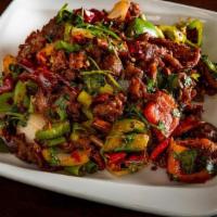 Cumin Gf' · Cumin crusted & cooked with bell peppers, onions and cilantro. Spicy