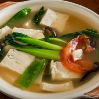 Tofu Pot Gf' · Soft tofu and mixed vegetables in traditional Chinese white sauce. No spice.
