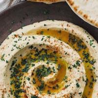 Hummus Platter · Vegetarian, gluten-free. 6 Falafel balls on a dish of hummus, tahini sauce, Israeli salad, p...