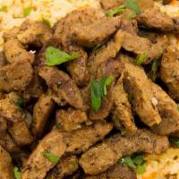 Shawarma · Vegetarian, gluten-free. Vegetarian “turkey-like” strips on a bed of basmati rice, side Isra...