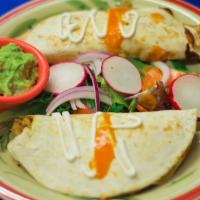 Quesadillas Mexico (2) · Chicken or steak. Flour tortilla filled with mix cheese topped with sour cream and side of g...