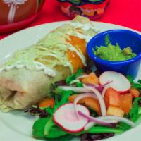 Super Burrito · Stuffed with rice and beans, cheese, lettuce, topped with sour cream, green, and red sauces ...