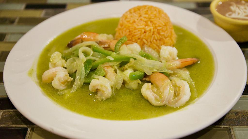 Camarones Del Monte Verde · Sautéed shrimp in green tomatillo sauce, onions, and green peppers. Served with Mexican rice and beans.