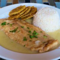 Pescado Al Limon · White fish filet with a lemon wine sauce, served with white rice and tostones.