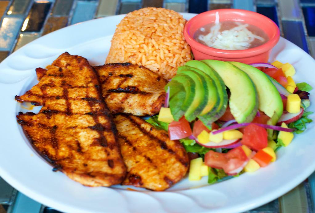 Pollo A La Parrilla · Grilled chicken breast seasoned with panchito’s sauce with mix greens, avocado, and mango.