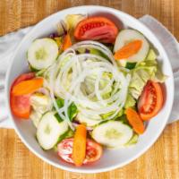 Tossed Salad · Crispy romaine and iceberg lettuce, tomatoes, cucumber and onion, carrots.