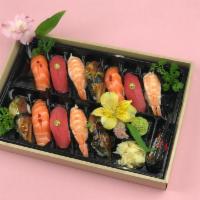 Memories Of Ocean Wave (Sushi) · 12 pieces of fresh Nigiri Sushi (raw fish on the rice). You can choose 4 sets of your favori...