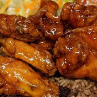 Wing Dinner · Wings served with Rice and an additional side.