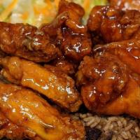 Wing Dinner ( All Flats / All Drums ) · Wings served with Rice and an additional side.