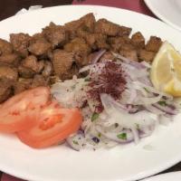 Fried Liver Cubes · Deep fried calf's liver served with onion, tomato, and lettuce.