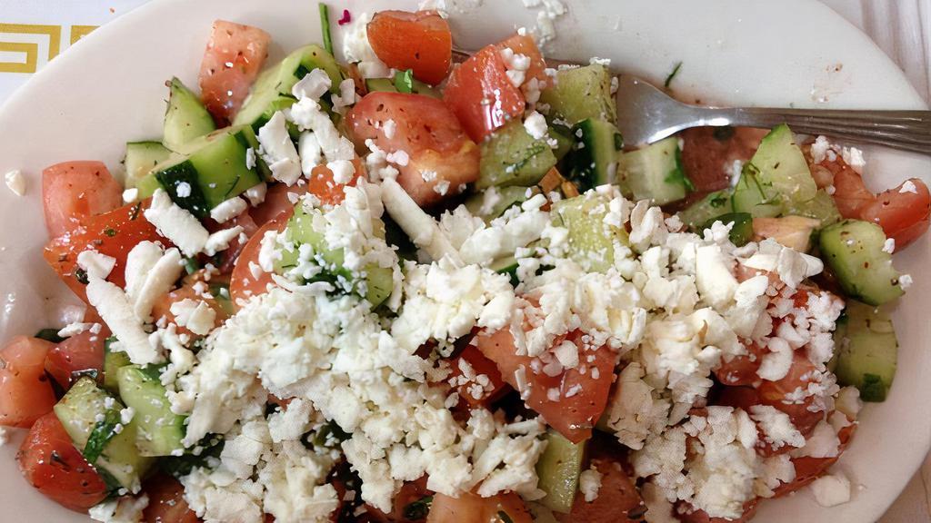 Shepherd Salad · Fresh tomatoes, green peppers, cucumbers, onions, parsley and dressing.