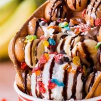 Rainbow Banana / 香蕉米脆 · (original bubble waffle, vanilla ice cream, banana, chocolate waffle stick, fruity pebbles, ...