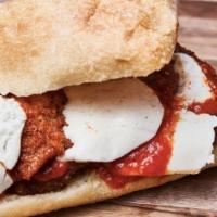 Chicken Parm · Breaded chicken cutlet with fresh Mozzarella cheese and. homemade Parmesan sauce.